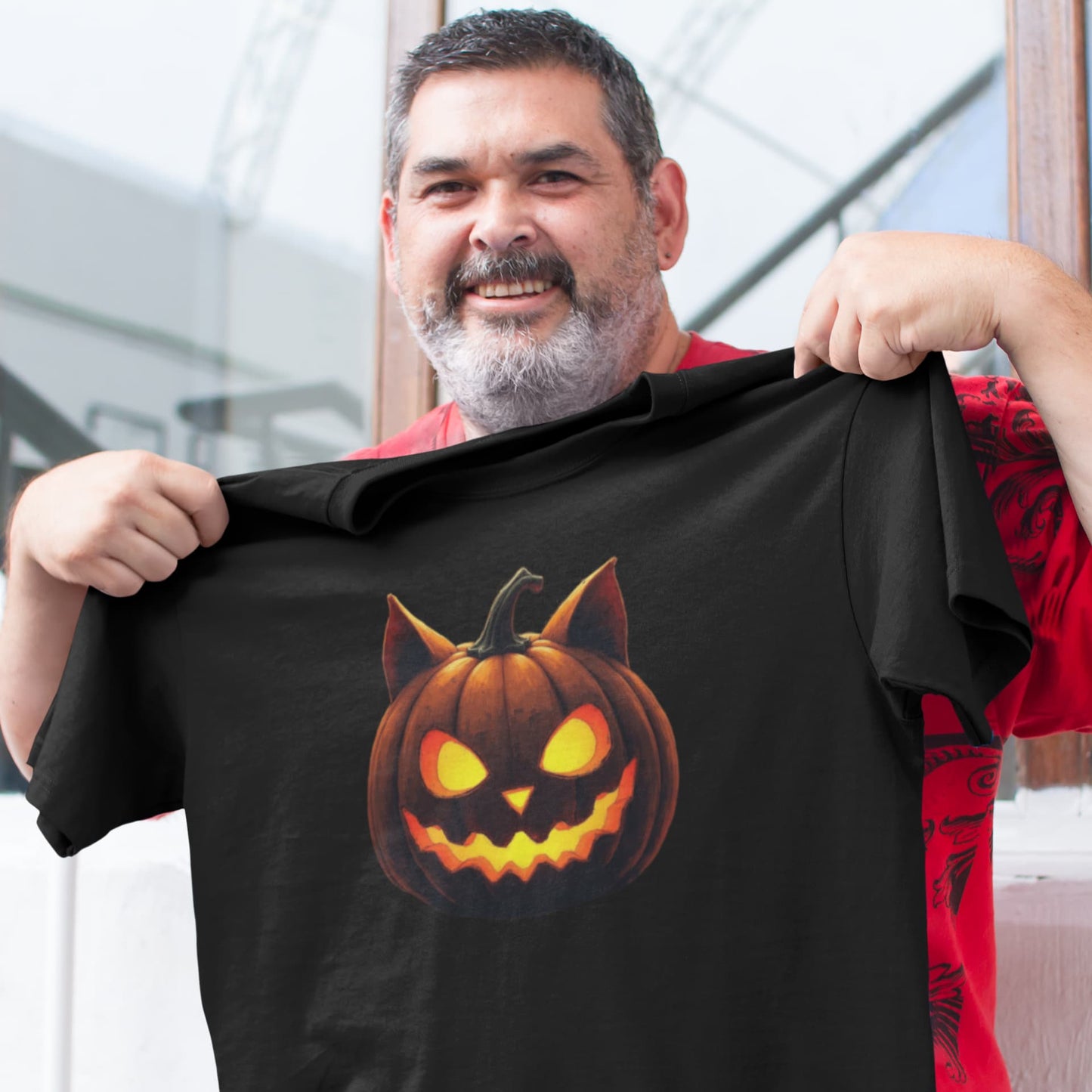 Mockup of unisex premium Cat-O’-Lantern Tomcat t-shirt with funny Halloween pumpkin cat design by Felinamia