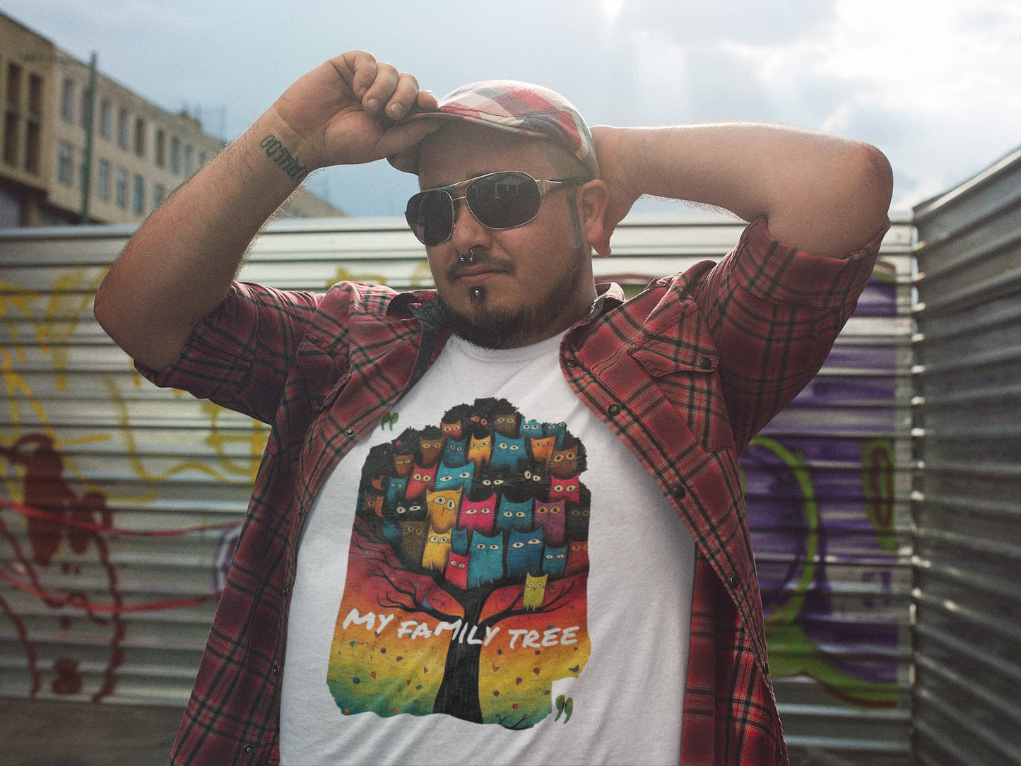 Model wearing My Family Tree cat graphic tee with colorful feline family tree artwork, casual unisex premium t-shirt