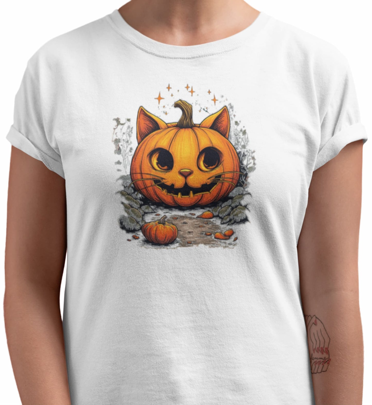 Close-up of Cat-O’-Lantern Kittycat t-shirt print showing pumpkin cat with glowing stars, gray foliage, and tiny pumpkin details