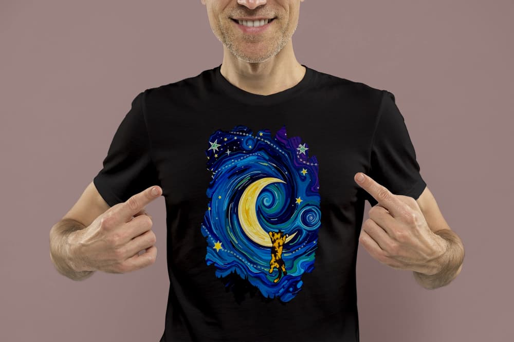 Mockup of The Starry Meownight cat t-shirt, Van Gogh inspired graphic tee with whimsical feline under starry sky