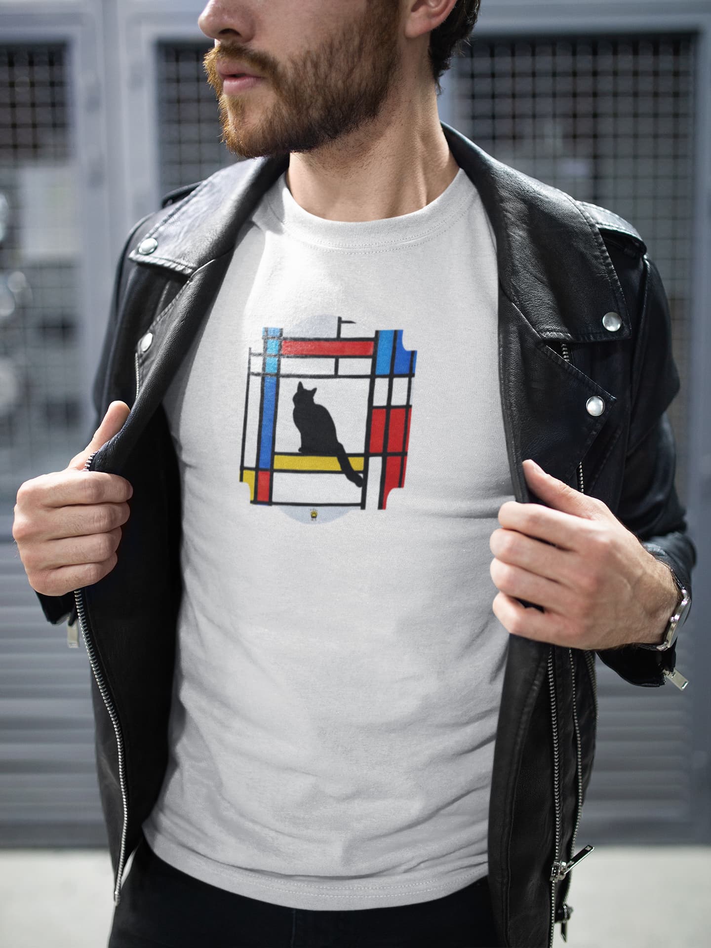 Model wearing Meowdrian Mondrian inspired cat t-shirt, abstract art unisex premium graphic tee with colorful feline design