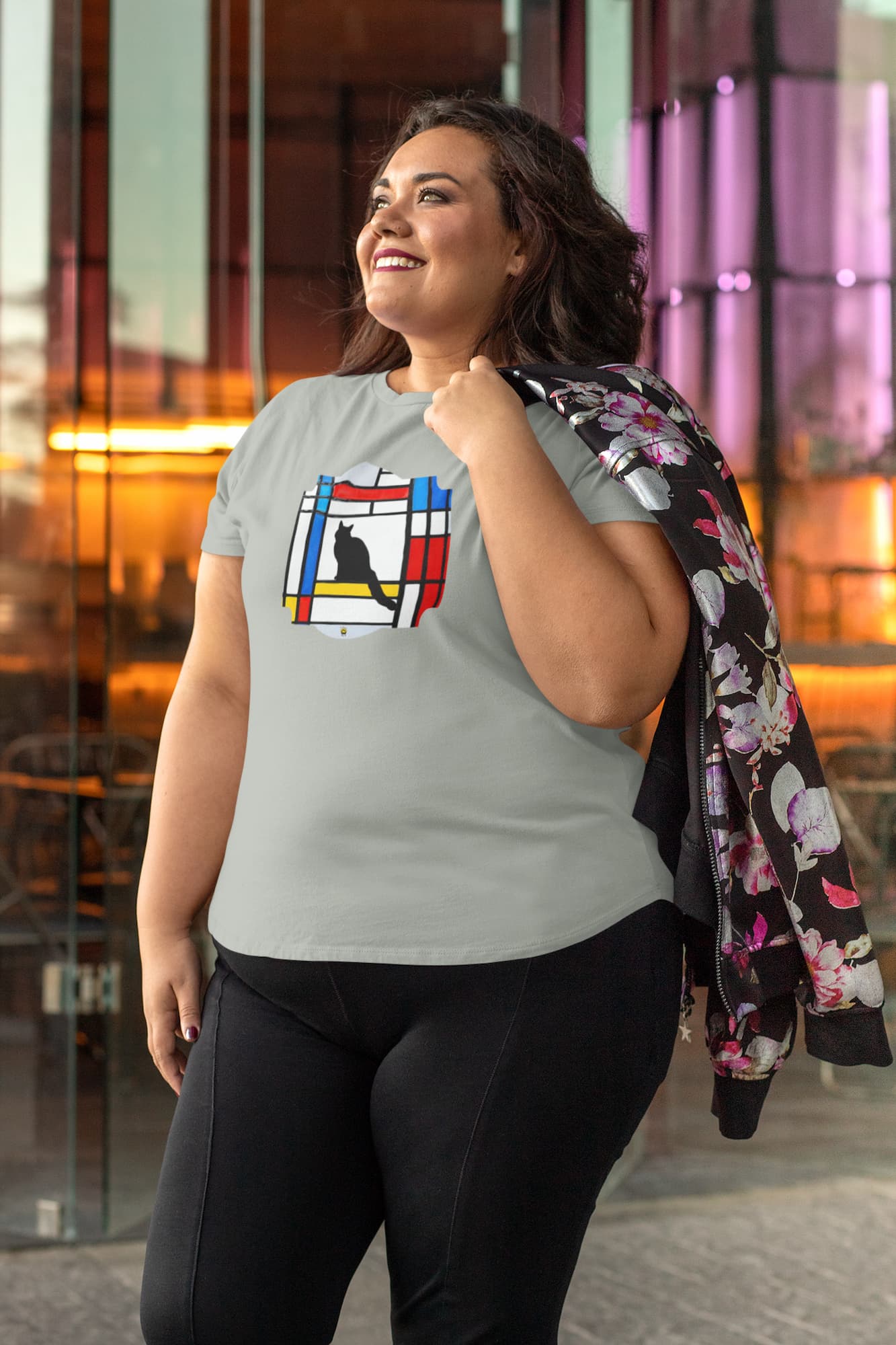 Model wearing Meowdrian Mondrian inspired cat t-shirt, abstract art unisex premium graphic tee with colorful feline design