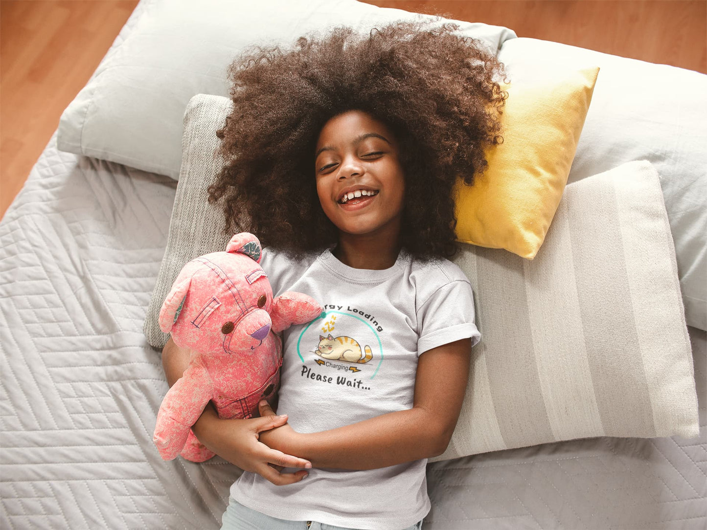 Model wearing Charger Cat Funny Sleeping Cat T-Shirt – unisex premium tee with napping kitty and energy loading graphic.