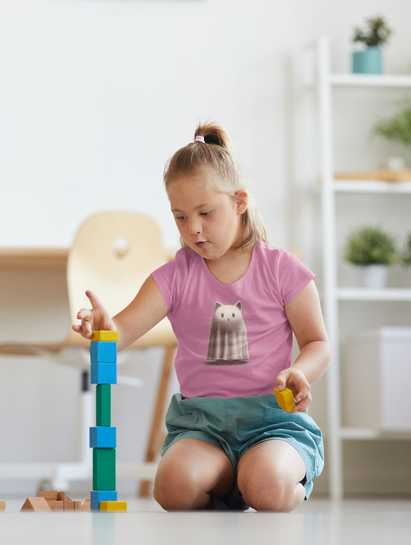 Kid wearing Kawaii Ghost T-Shirt – classic kids tee with vintage ghost cat design in sketch-style graphite lines.