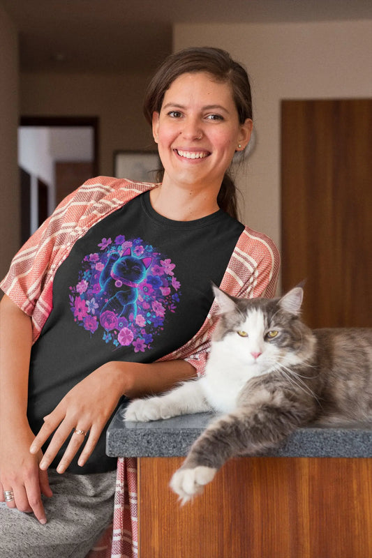 Mockup of a cat t-shirt featuring the Maneki in Bloom design, with a floral Maneki Neko surrounded by vibrant flowers and a bold retro-futuristic color palette.