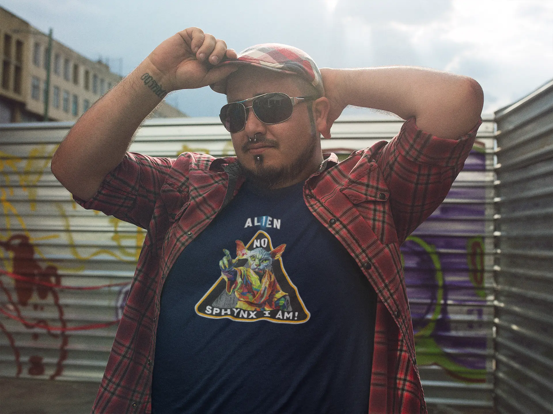 Mockup of the 'I Am Sphynx, Not Alien - The Galactic Hairless’ T-shirt featuring a Sphynx cat styled as a wise galactic master, blending feline charm with sci-fi humor.