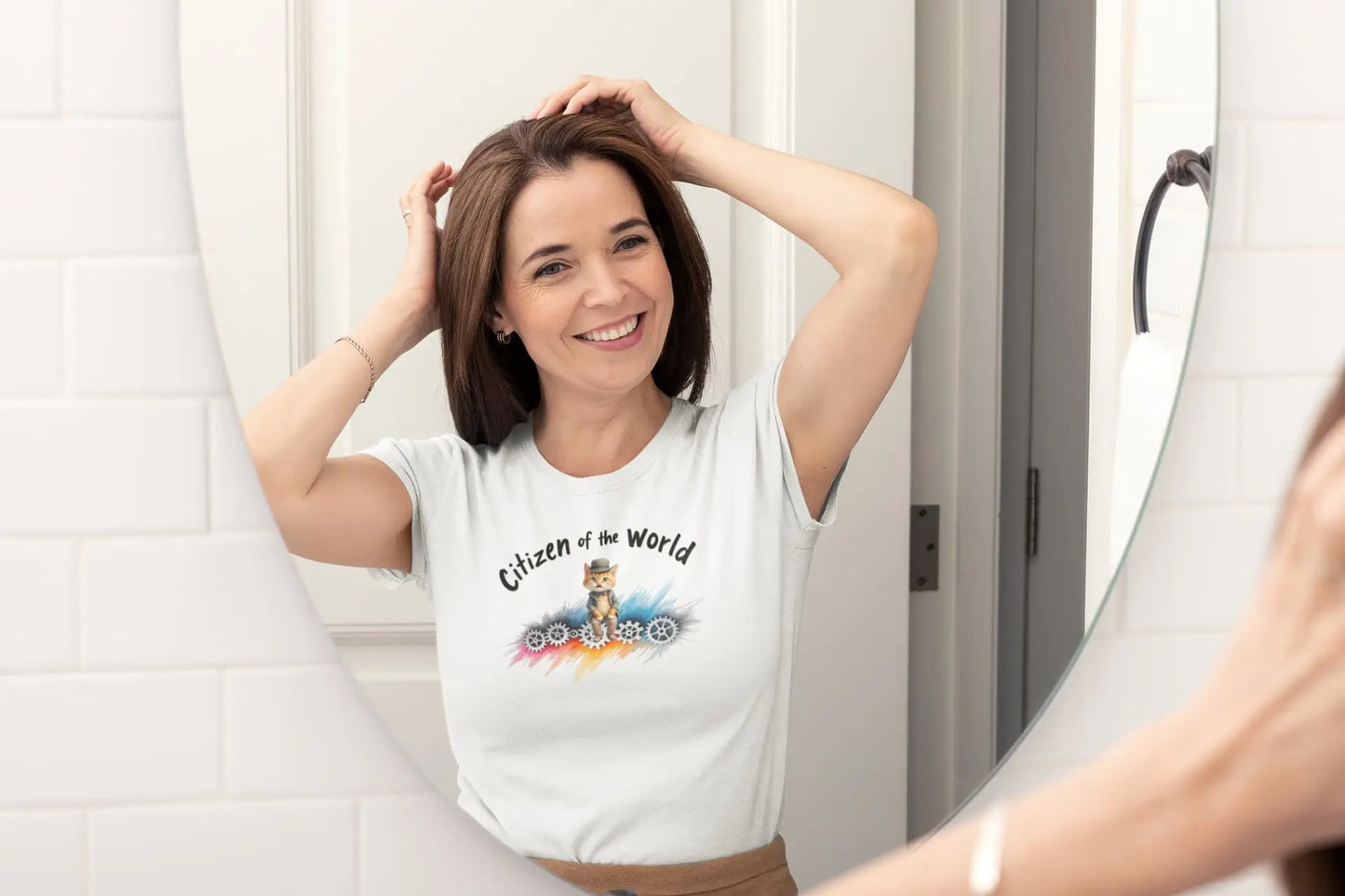 Person wearing Citizen of the World unisex T-shirt – vintage-style cat design inspired by Chaplin’s Modern Times, perfect for art and cat lovers.