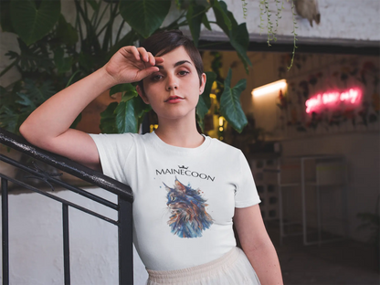 Mockup of the 'Majestic Mane – The Maine Coon Edition' T-shirt featuring an elegant artistic portrait of a Maine Coon cat in blue and brown abstract strokes.