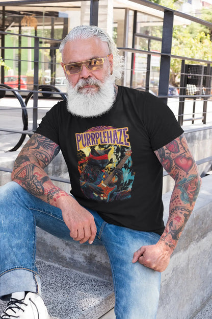 Person wearing the “PURRPLE HAZE – Psychedelic Guitar” t-shirt, featuring a vibrant illustration of a cat guitarist in a retro psychedelic style inspired by Jimi Hendrix