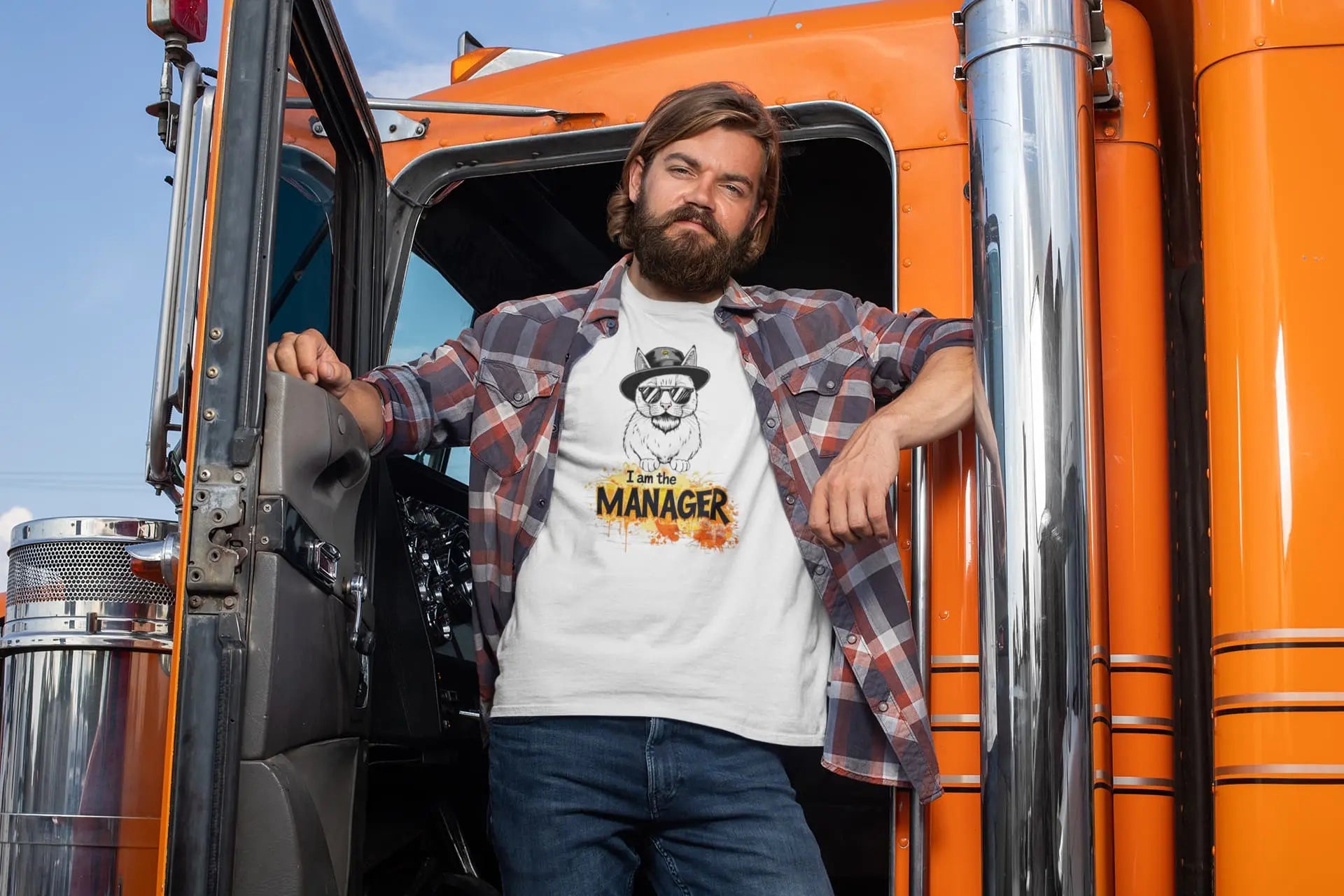 Person wearing I Am the Maneger T-Shirt – cool minimalist cat design with pop culture references and confident feline vibes.