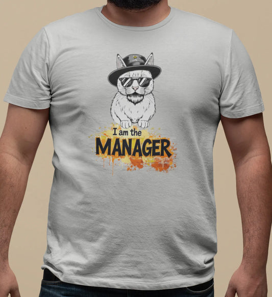 Close-up of I Am the Maneger cat design – minimalist feline in sunglasses and hat, evoking smart humor and bold personality.