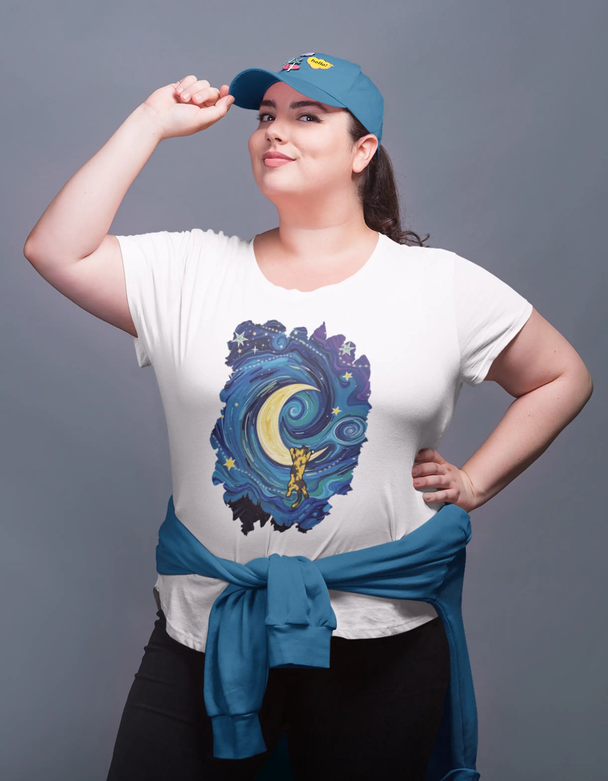 Model wearing The Starry Meownight Van Gogh inspired cat t-shirt, unisex premium graphic tee with swirling starry sky design