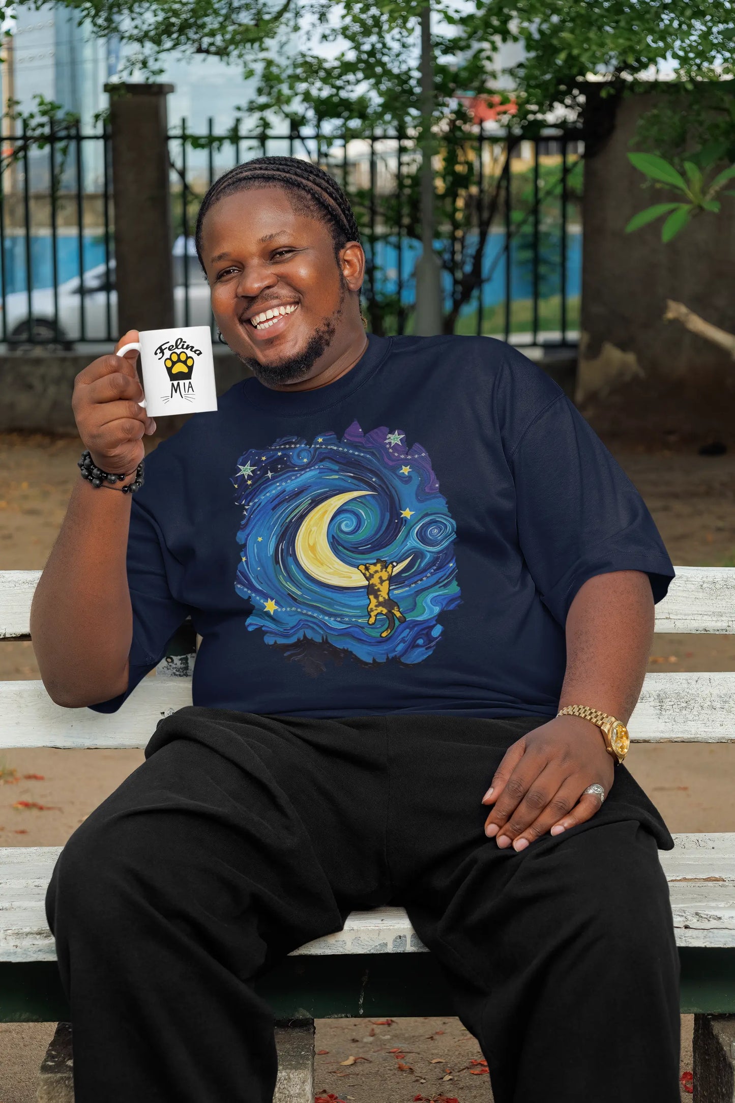 Mockup of The Starry Meownight cat t-shirt, Van Gogh inspired graphic tee with whimsical feline under starry sky