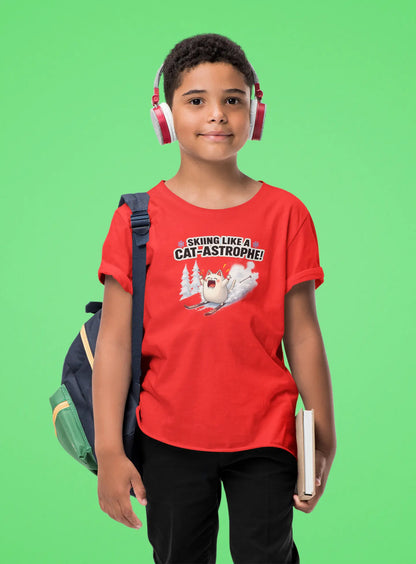 Person wearing Cat-Astrophe Winter Cat T-Shirt in snowy mountain setting – fun unisex tee for cat lovers who enjoy ski humor and playful winter vibes.