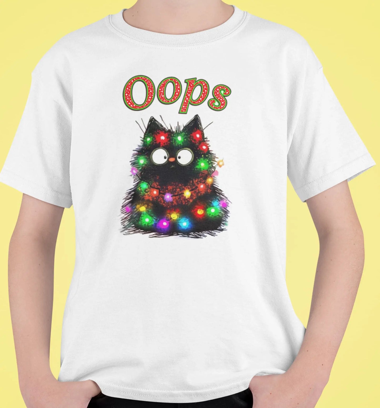 Close-up of Santa Claws Oops design – mischievous black cat tangled in colorful Christmas lights with playful holiday vibe.