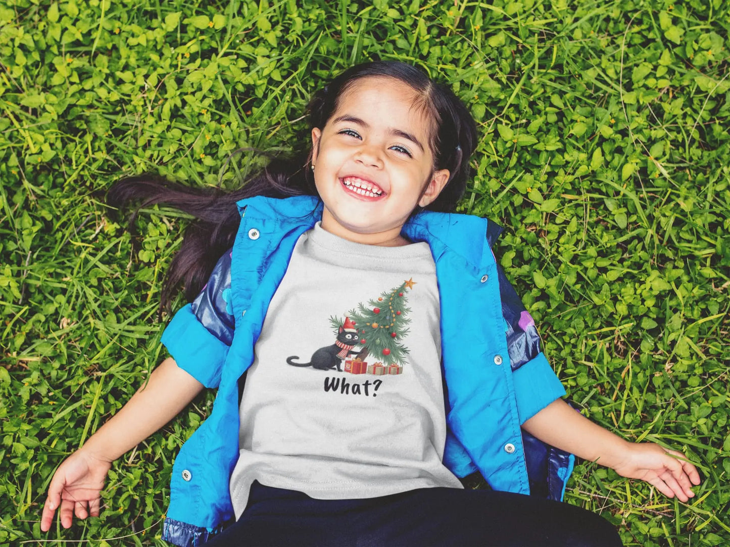 Person wearing Mission: Tree Impossible Cat T-Shirt while setting up Christmas decorations – funny festive tee for cat owners and holiday humor fans.