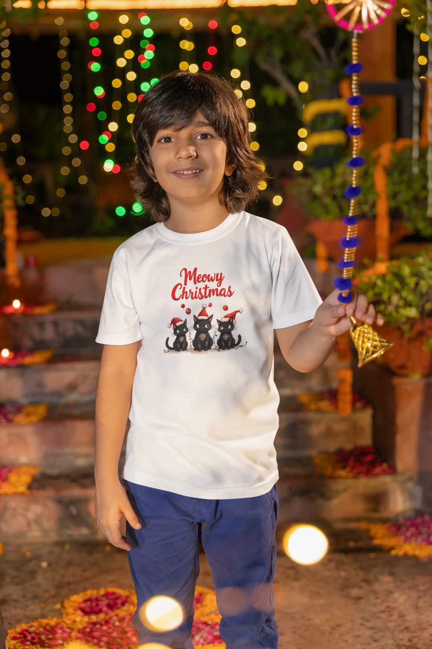 Model wearing Meowy Christmas Funny Cat T-Shirt – unisex premium tee featuring three black cats in Santa hats tangled in holiday lights.