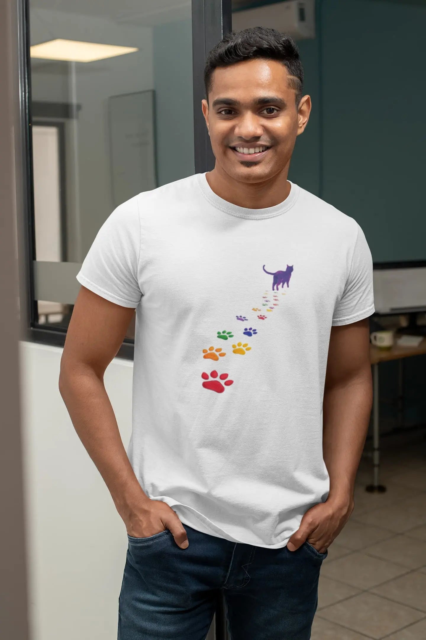 Model wearing Steps of Pride T-Shirt – unisex premium tee with minimalist black cat walking toward rainbow horizon, symbolizing pride and authenticity.