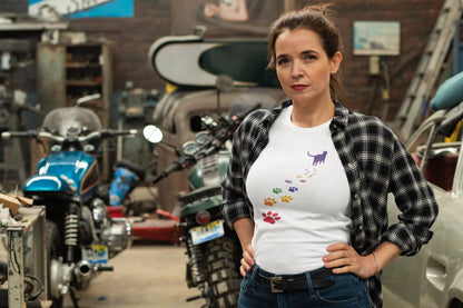 Person wearing Steps of Pride unisex T-shirt outdoors – stylish minimalist cat design representing pride, love, and self-expression.