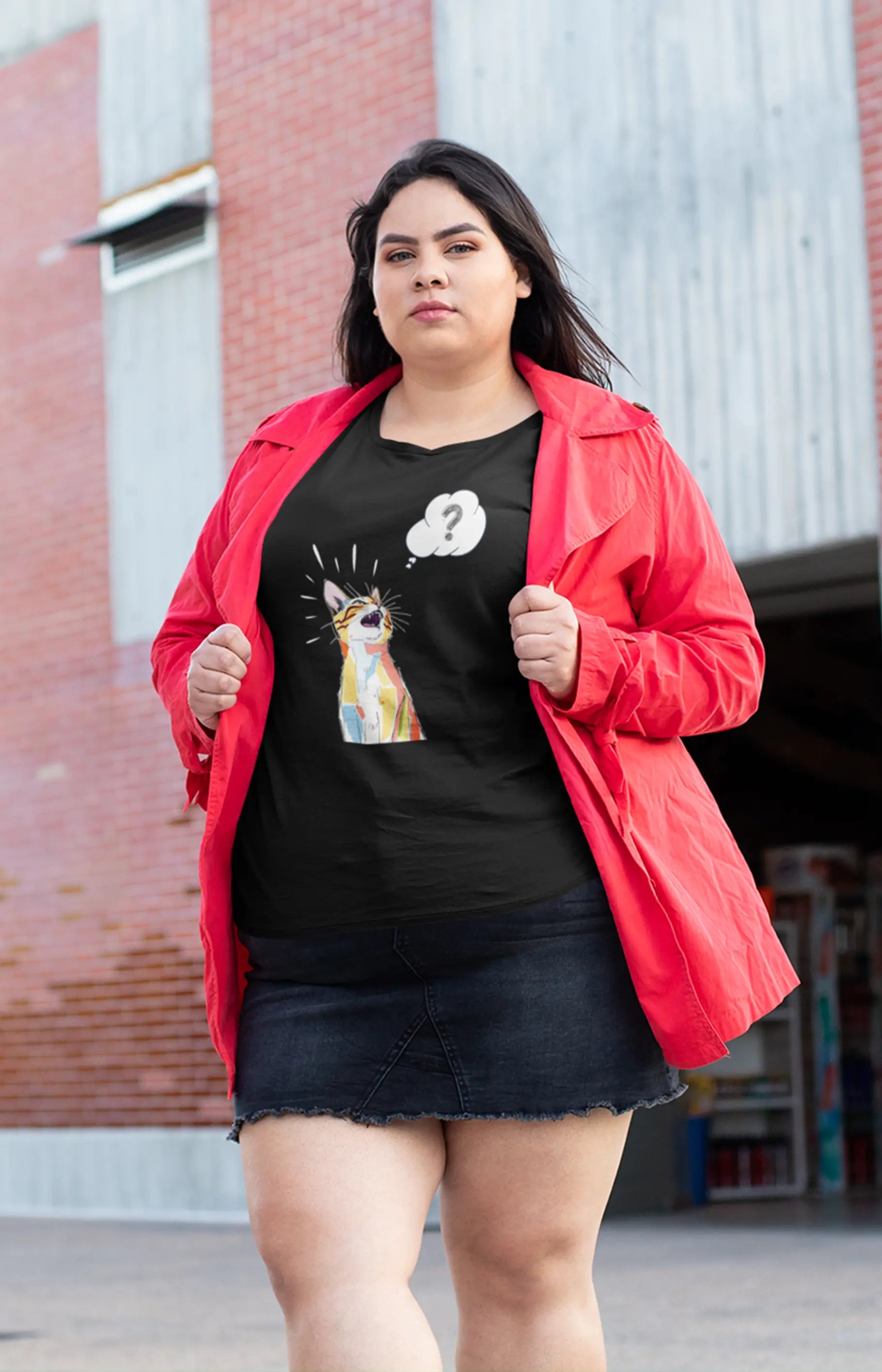 Model wearing What? Funny Cat T-Shirt – minimalist sarcastic cat design, premium unisex crewneck.