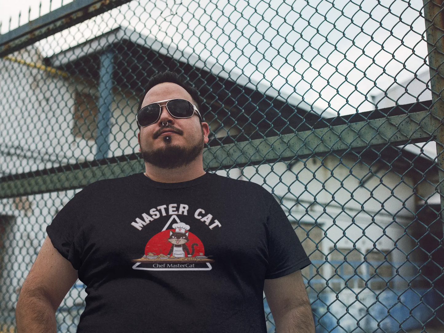 Model wearing Chef Mastercat Funny Cat Chef T-Shirt – unisex premium tee with humorous cooking cat design.