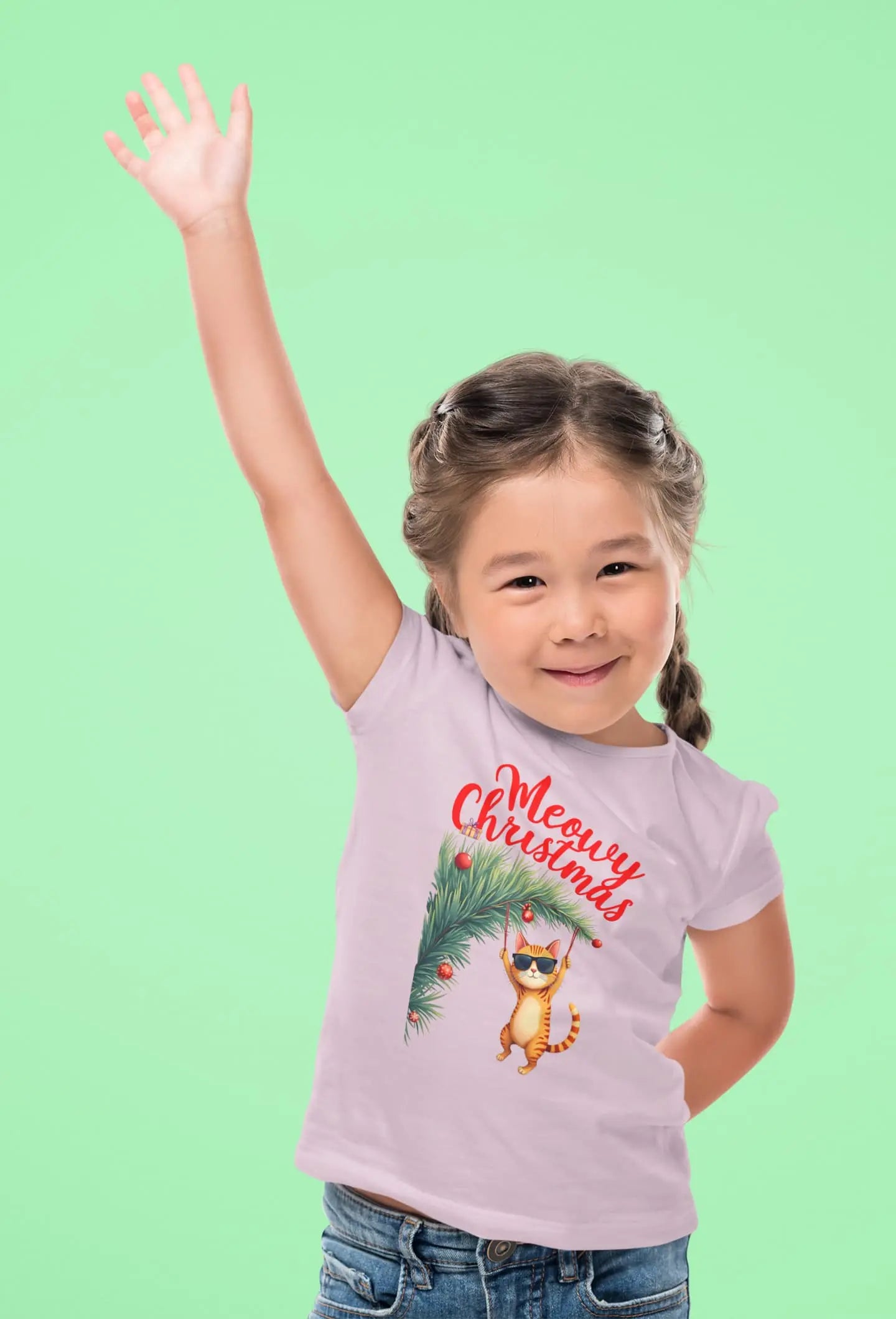 Person wearing Tree Diving Christmas Cat T-Shirt while setting up decorations – funny festive tee for cat owners and holiday humor fans.