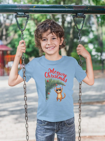 Model wearing Tree Diving Funny Christmas Cat T-Shirt – unisex premium tee featuring an orange cat in sunglasses hanging from a Christmas tree.