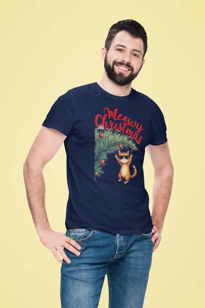 Model wearing Tree Diving Funny Christmas Cat T-Shirt – unisex premium tee featuring an orange cat in sunglasses hanging from a Christmas tree.