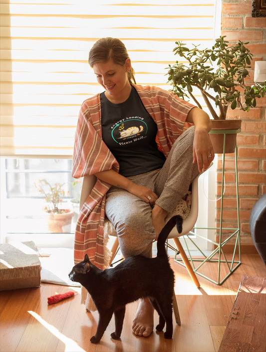 Model wearing Charger Cat Funny Sleeping Cat T-Shirt – unisex premium tee with napping kitty and energy loading graphic.
