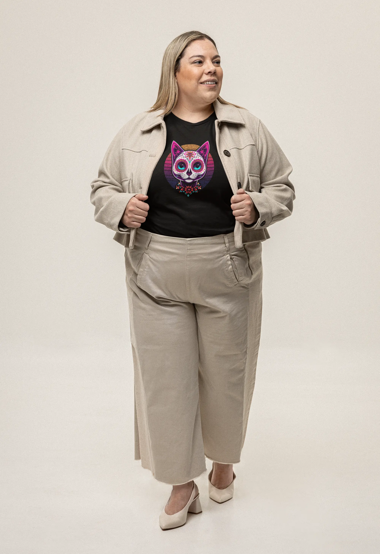 Model wearing Cat of Los Muertos T-Shirt – classic women’s tee with vibrant Día de los Muertos cat design.
