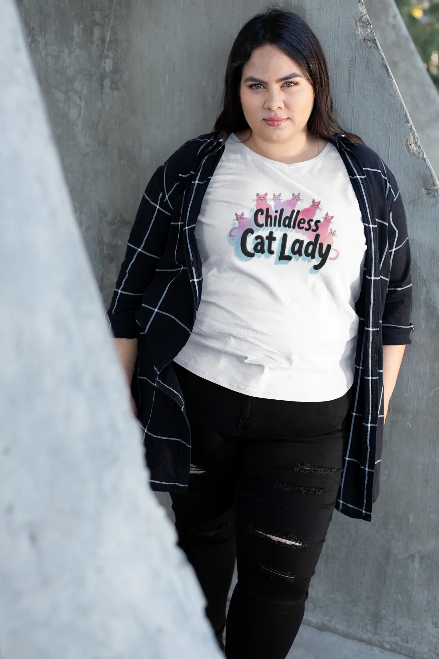 Mockup of Childless Cat Lady women’s t-shirt with bold text and minimalist cat illustrations