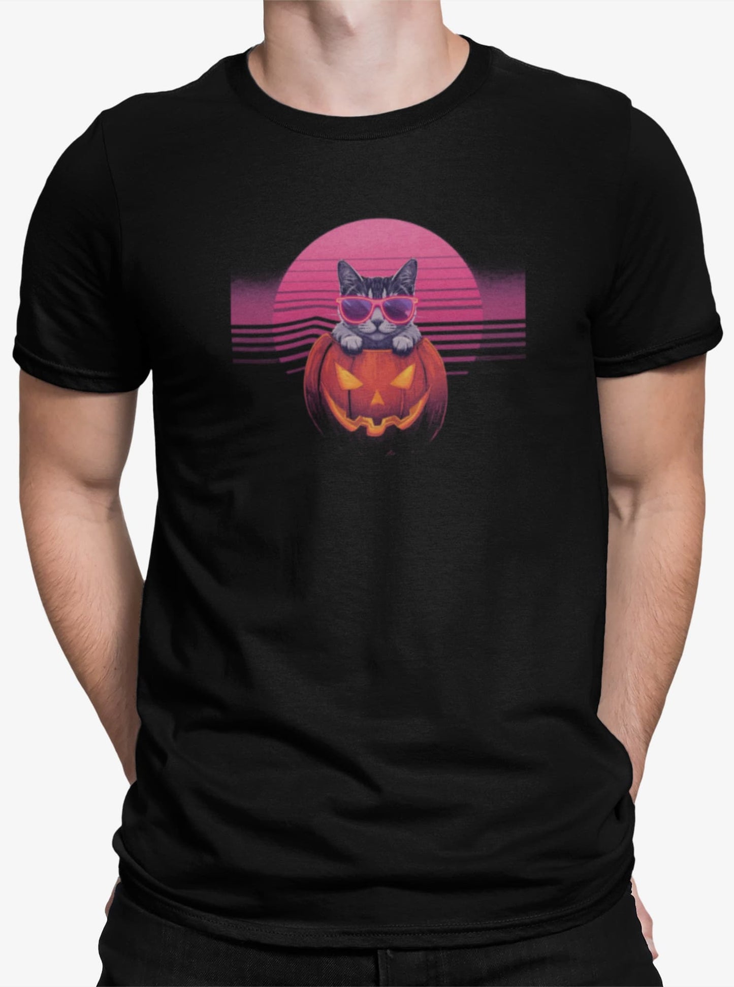 Close-up of Neon Pumpkin Cat T-Shirt print – neon cat wearing sunglasses inside jack-o’-lantern, synthwave pink and purple backdrop.