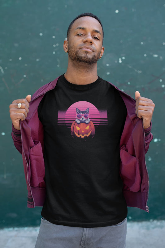 Model wearing Neon Pumpkin Cat T-Shirt – unisex premium tee featuring neon cat inside jack-o’-lantern with synthwave sunset.