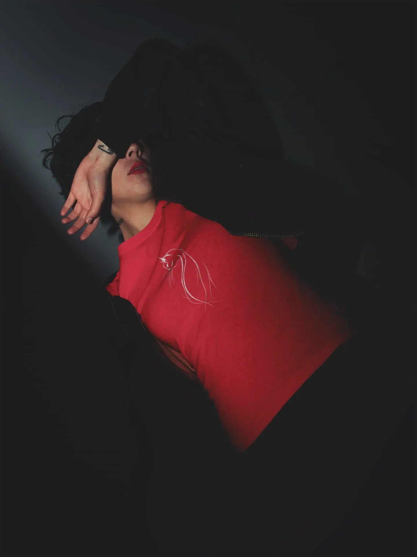 Mockup of The Feline Form classic women’s t-shirt with elegant minimalist cat silhouette design