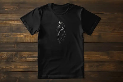 Flat lay of The Feline Form women’s t-shirt showcasing graceful feline artwork in refined lines