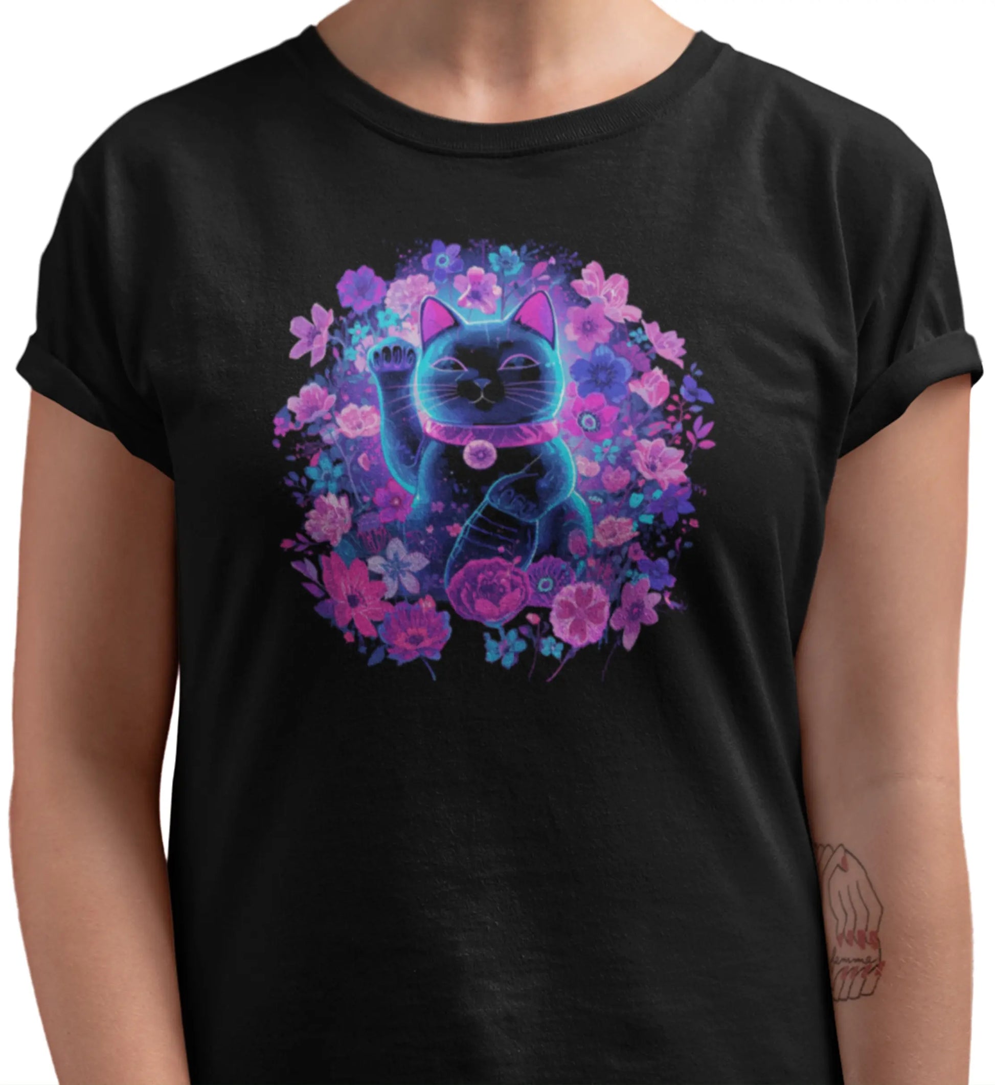 Close-up detail of the Maneki in Bloom t-shirt print, highlighting the floral lucky cat illustration, vivid colors, expressive details, and artistic spring-inspired composition.
