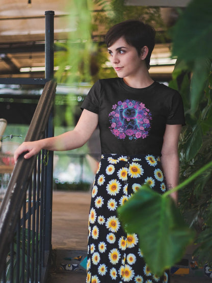 Model wearing the Maneki in Bloom cat t-shirt, featuring a floral Maneki Neko design with vibrant flowers and a stylish retro-futuristic spring aesthetic.