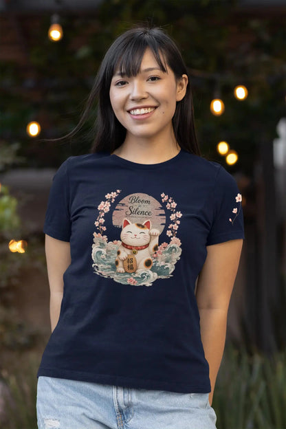 Person wearing the Bloom in Silence t-shirt featuring a Japanese-inspired Maneki Neko and cherry blossom artwork.